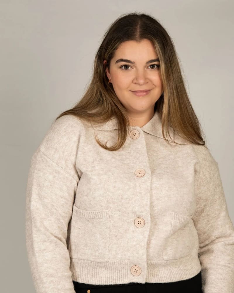 Front of a model wearing a size 3X Olivia Cardigan Collar Buttons Pockets in Beige by ANNICK. | dia_product_style_image_id:317388